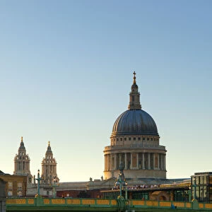 UK, London, St. Pauls Cathedral and Canon Street Railway Bridge across River