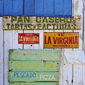 Uruguay, Rocha Department, Cabo Polonio, Advertisements on the wall of the storehouse