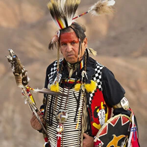 USA, California, Lakota indian Jim Yellowhawk standin in full regalia at Zabriskie