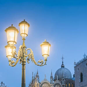 Venice, Veneto, Italy. St Marks Basilica at dusk from Piazzzetta San Marco