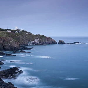 View from Lizard Point over rocky Polpeor Cove and onto the Lizard Lighthouse