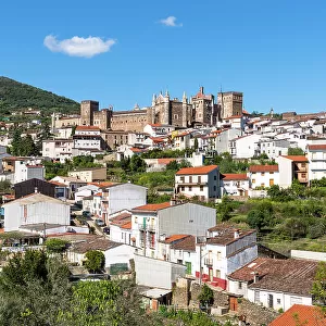 View towards town of Guadalupe and the Royal Monastery of Saint Mary of Guadalupe (Real Monasterio de Santa Maria de Guadalupe), a Roman Catholic monastic establishment built during the 14th century, Extremadura, Caceres, Spain