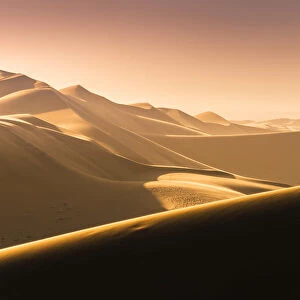 Walvis Bay, Namibia, Africa. Tourist. Sand dunes at sunset
