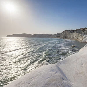 White cliffs known as Scala dei Turchi frame the turquoise sea Porto Empedocle province