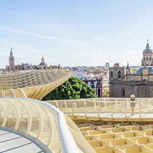 A woman at the Metropol Parasol, Seville, Andalusia, Spain. MR