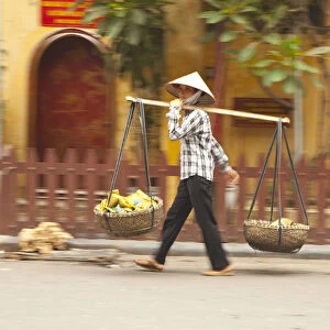 Woman street vendor, Old Quarter, Hanoi, Vietnam