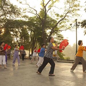 Women performing Thi Chi near Hoan Kiem Lake, Old Quarter, Hanoi, Vietnam