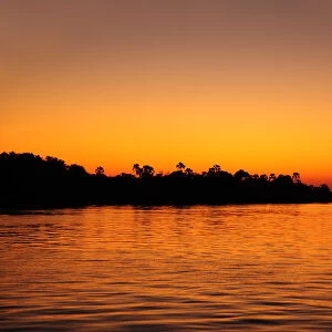 Zambezi River at sunset, near Victoria Falls, Zimbabwe, Africa