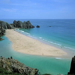 Porthcurno beach near the Minnack Theatre in West Cornwall. Lagoon at low tide