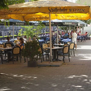 Germany, Berlin, Mitte, Cafes, restaurants and bars under leafy shade on the banks of the