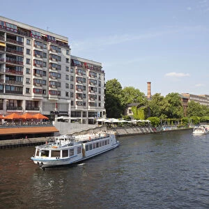 Germany, Berlin, Mitte, Tourist Cruise boats on the River Spree near Friedrichstrasse