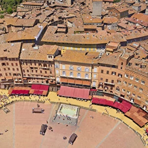 Italy, Tuscany, Siena, Piazza del Campo viewed from top of the Torre del Mangia with the