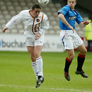 Moment of Triumph: Gavin Rae and Phil O'Donnell Secure Rangers Win Against Motherwell (04/04/04)