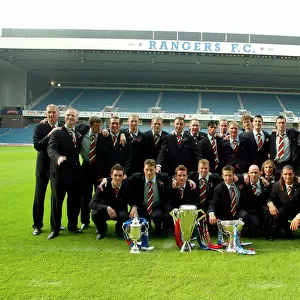 Rangers arrive back at Ibrox after winning the Treble. 31 / 05 / 03