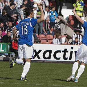 Rangers Carlos Bocanegra and Gregg Wylde: Celebrating a 0-4 Goal Over Dunfermline Athletic