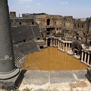 The 2nd century Roman amphitheatre is flooded following heavy rain in the historic