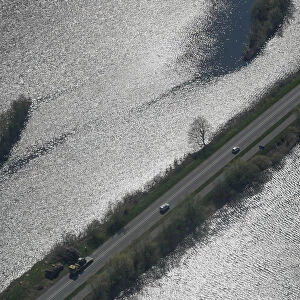 Aerial view of a road surrounded by water near Amsterdam