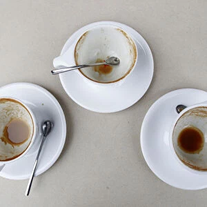 Three empty cups on a table are pictured at the Silver lake location of Intelligentsia Coffee