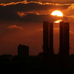 The Gaza power plant is seen during sunset in the central Gaza Strip