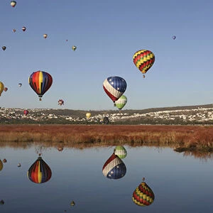 Hot air balloons fly over the Metropolitano park during the International Hot-Air