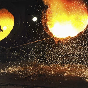 A labourer works at the Maanshan steel and iron factory in Hefei
