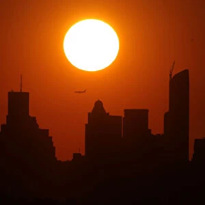 The sun sets over New York city as viewed from the Arthur Ashe Stadium, venue of the U. S