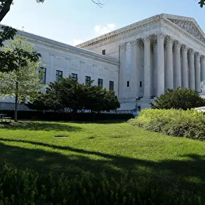 Trees cast shadows outside the U. S. Supreme Court in Washington