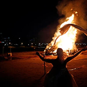A woman performs during a celebration ahead of Jeongwol Daeboreum (Great Full Moon)