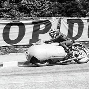 Bill Lomas (Guzzi) at Braddan Bridge, 1955 Junior TT