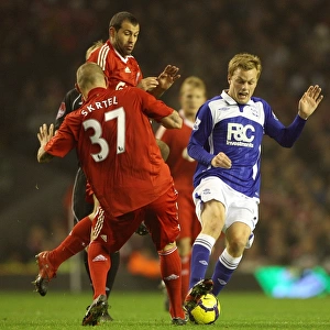 Intense Rivalry: Skrtel, Mascherano vs. Larsson - Liverpool vs. Birmingham City's Battle for the Ball (09-11-2009, Anfield)