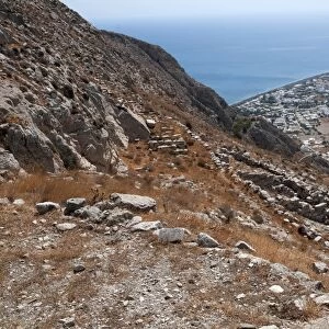 Ancient city ruins, Sanctuary of Aphrodite, with Perissa in background, Ancient Thera, Mesavouno, Santorini, Cyclades