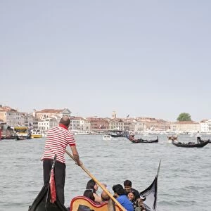 Gondola with tourists on canal, Grand Canal, San Marco District, Venice, Veneto, Italy, May