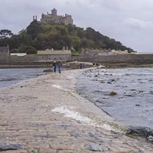 Seawater covering manmade causeway to tidal island, St. Michaels Mount, Mounts Bay, Marazion, Cornwall, England, May