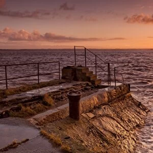 View of jetty at sunrise, Sudbrook Jetty, River Severn, Severn Estuary, Monmouthshire, Wales, January