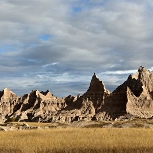 View of prairie and eroded rock formations, Badlands N. P. South Dakota, U. S. A. september