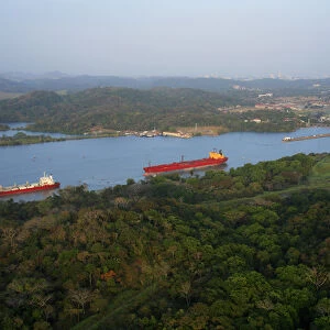 aerial image of ship in the Panama Canal, close to the Miraflores and Pedro Miguel