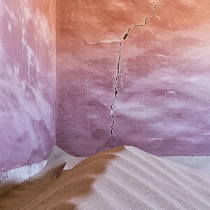 Africa, Namibia, Kolmanskop. Sand-filled corner in abandoned house