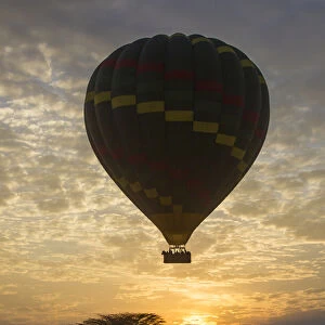 Africa. Tanzania. Hot air balloon crossing the Mara river in Serengeti NP