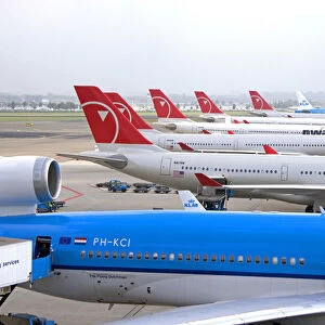 Airplanes parked at Schiphol Airport in Amsterdam, Netherlands