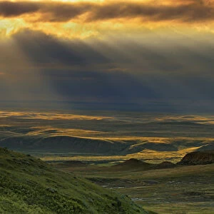Canada, Saskatchewan, Grasslands National Park. Killdeer Badlands at sunset. Credit as