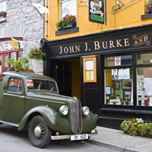 Clonbur, Ireland. An old truck sits outside John Burkes, a well-known restaurant