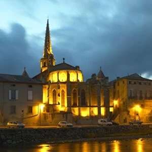The gothic St Martin Church and the bridge across the l Aude river. Town of Limoux