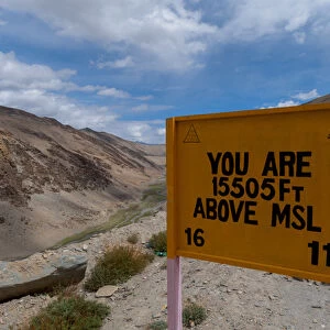 India, Jammu & Kashmir, Ladakh a road sign announcing You Are 15505 Ft Above