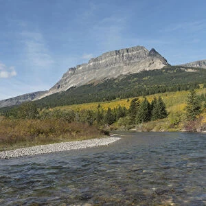 Saint Mary River and Singleshot Mountain in autumn, Glacier National Park, Montana