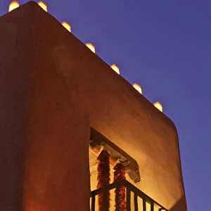 Santa Fe, New Mexico, United States. Tradional farolitos light up adobe structures