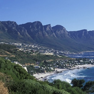 South Africa, Cape Town, Afternoon sun lights Camps Bay and Twelve Apostles mountains
