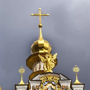 St. Michaels Golden-Domed Monastery, Steeple Spire Facade, Kiev, Ukraine. Saint Michaels is a functioning Greek Orthodox Monastery in Kiev. The monastery was created in the 1100s but was destroyed by the Soviet Union in the 1930 s