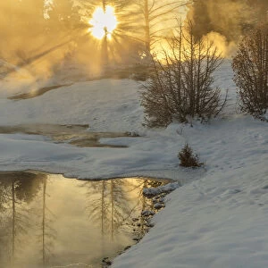 Sunrise greets Grassy Spring at Mammoth Hot Springs in Yellowstone National Park