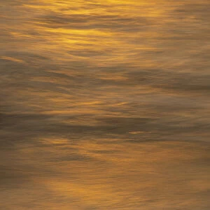 USA, New Jersey, Cape May National Seashore. Ocean reflections at sunset