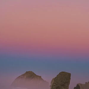 USA, Oregon, Bandon. Sunrise on sea stacks